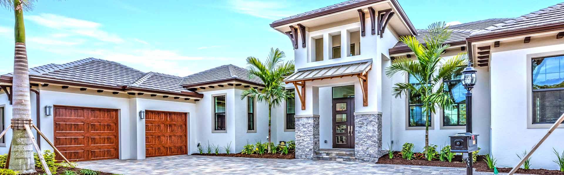 Spanish style home with metal roof
